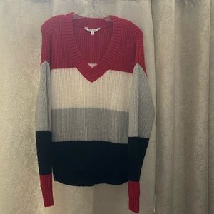 Multi color sweater.